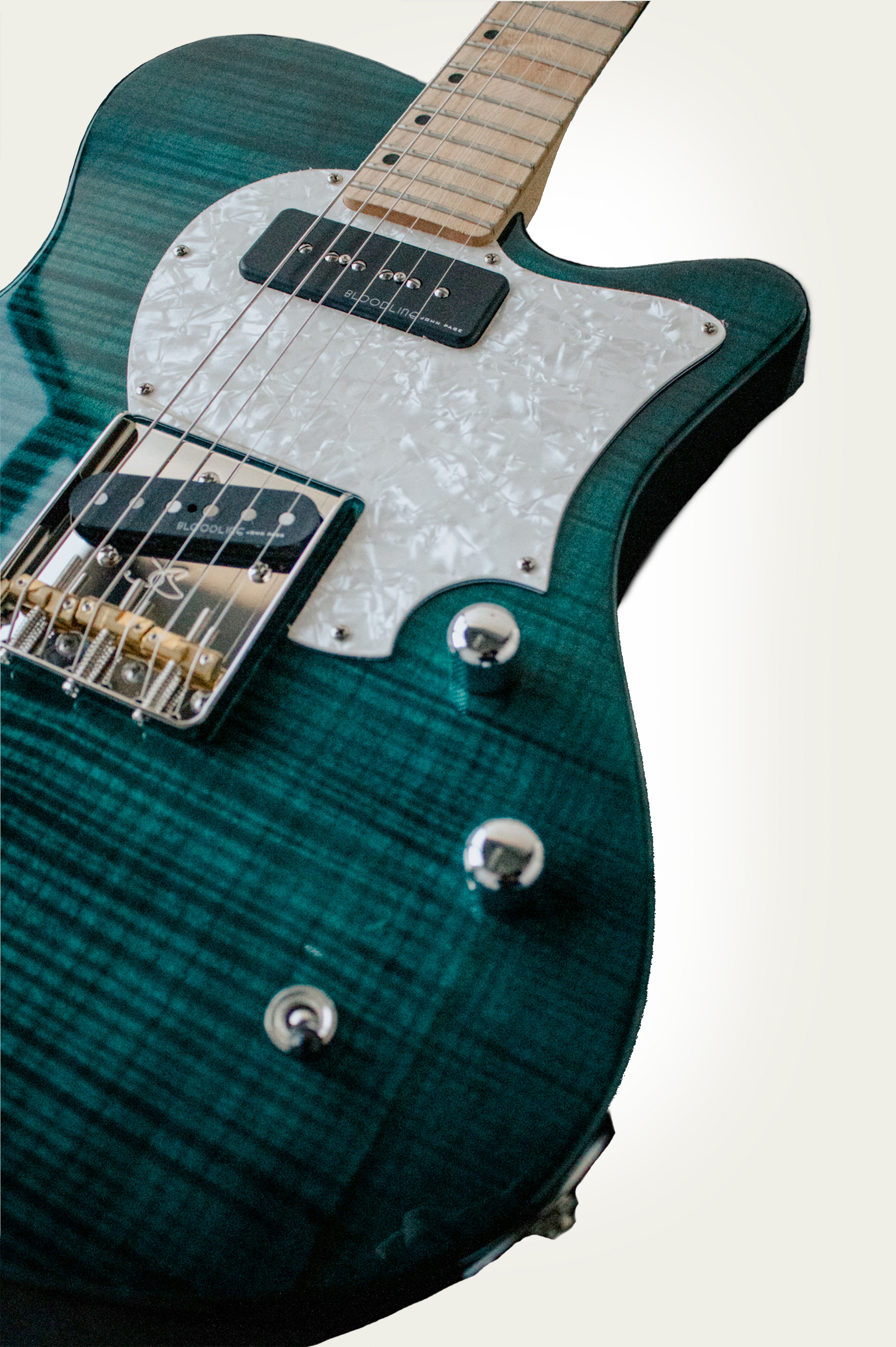 AJ Trans Aqua Mahogany angled close front view.